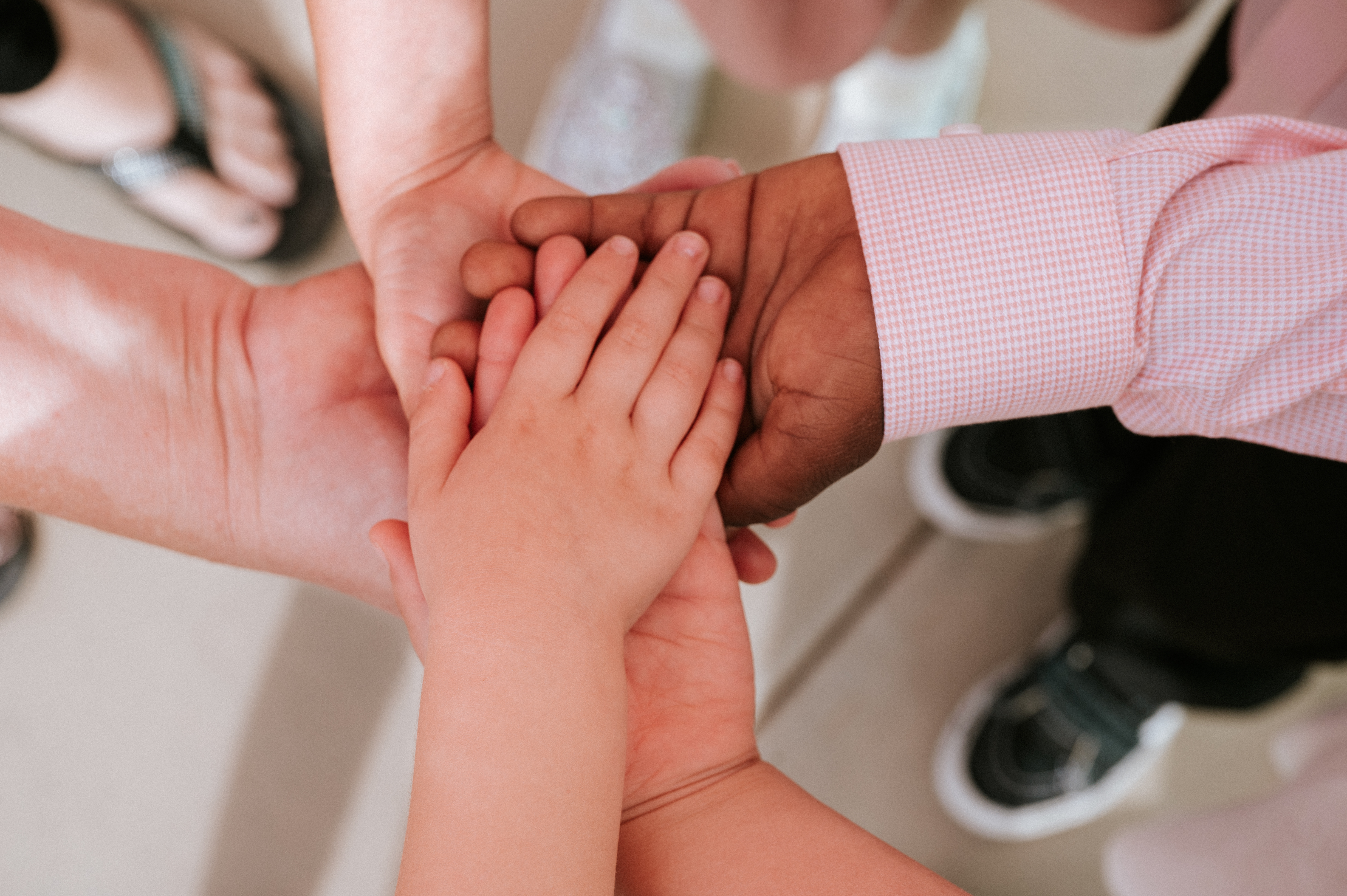 The Foster Alliance hands clasped