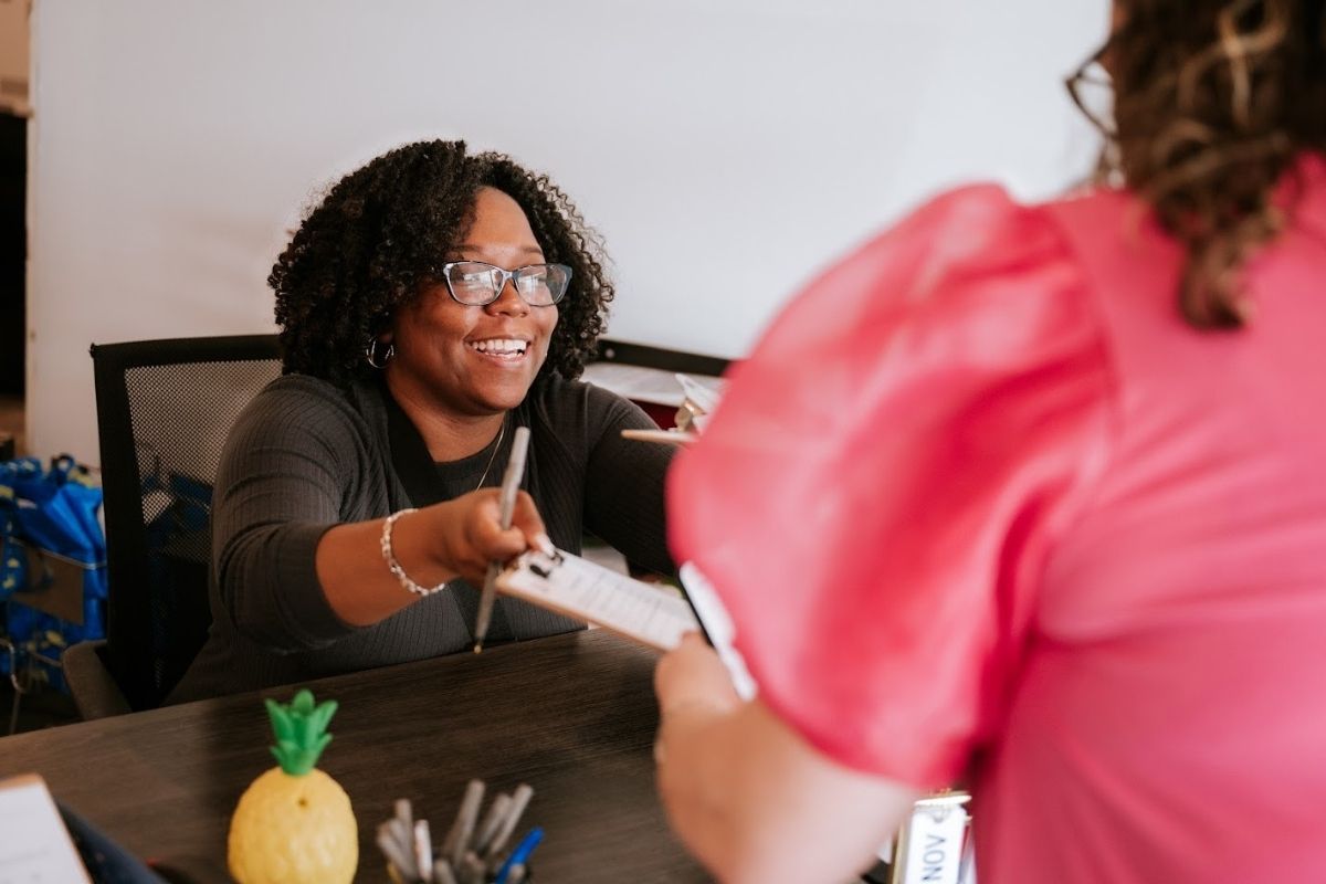 Foster Alliance Check In Woman With Smile Foster Alliance Check In Woman With Smile